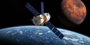 Futuristic NASA spacecraft launching from Earth towards Mars, symbolizing 2025 missions.